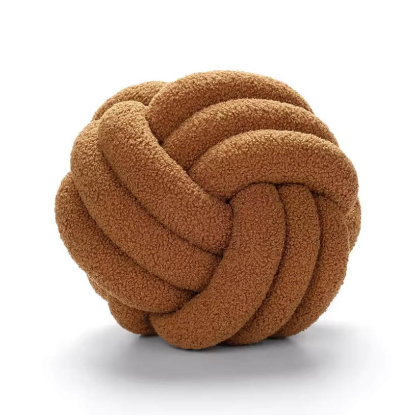 Brown Knot Plush Pillow with soft textured fabric perfect for cozy home decor