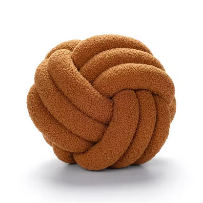 Brown Knot Plush Pillow with soft textured fabric perfect for cozy home decor