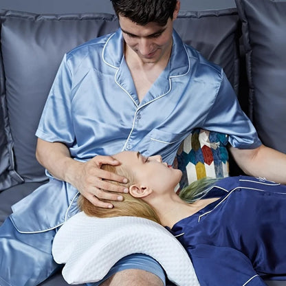 Couple Memory Pillow supporting head and neck of woman resting on partner's lap in blue satin pajamas