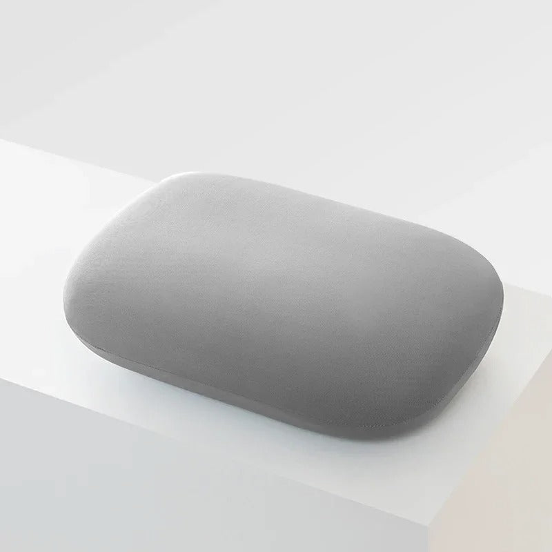 Gray ergonomic memory foam pillow by getblissyneck designed for comfortable neck support