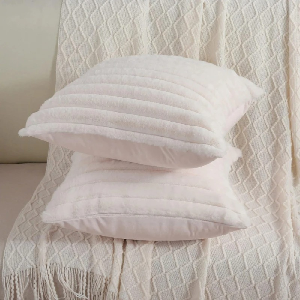 Soft and cozy Throw Pillow White Case set on a textured cream blanket for home decor