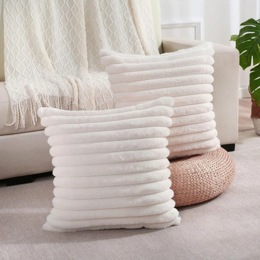 Soft textured Throw Pillow White Case with horizontal ribbed design in a cozy living room setting
