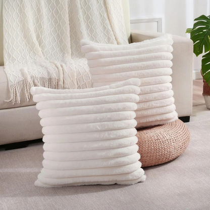 Soft textured Throw Pillow White Case with horizontal ribbed design in a cozy living room setting
