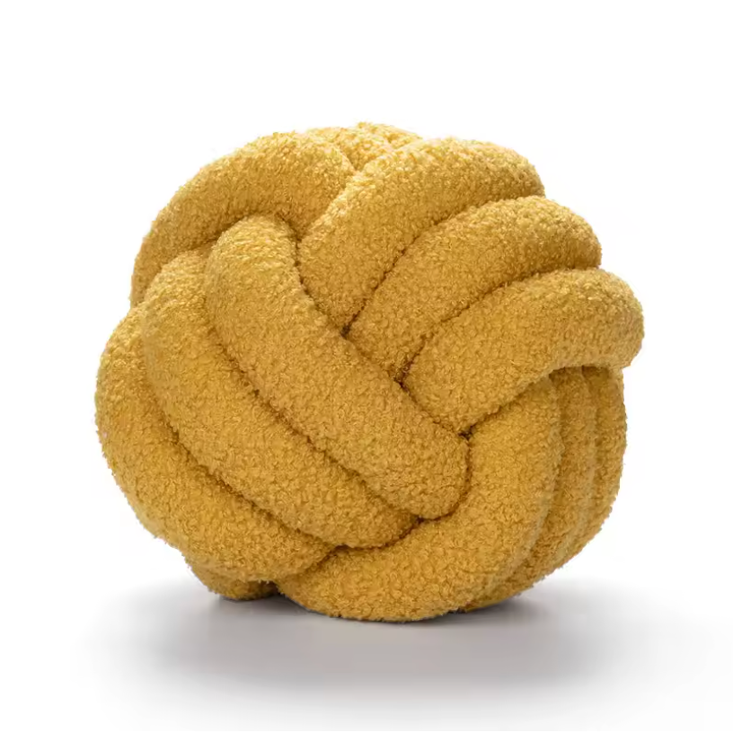 Soft yellow Knot Plush Pillow with a unique knotted design for cozy home decor