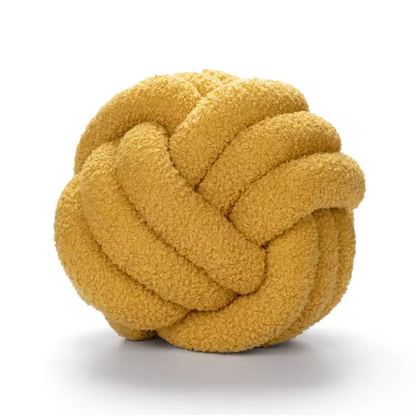 Soft yellow Knot Plush Pillow with a unique knotted design for cozy home decor